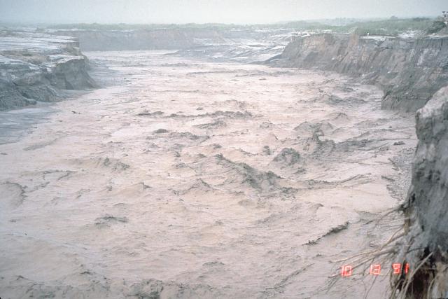 A powerful lahar makes its way down the Mt Pinatubo volcano at great speeds, easily destroying much in its path.